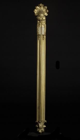 Napoleon III Carved Giltwood Wall Barometer: Napoleon III Carved Giltwood Wall Barometer, third quarter 19th century, of tall narrow form in the late Louis XVI style, the upper terminal modeled as a large stylized upright giltwood shell, the bas