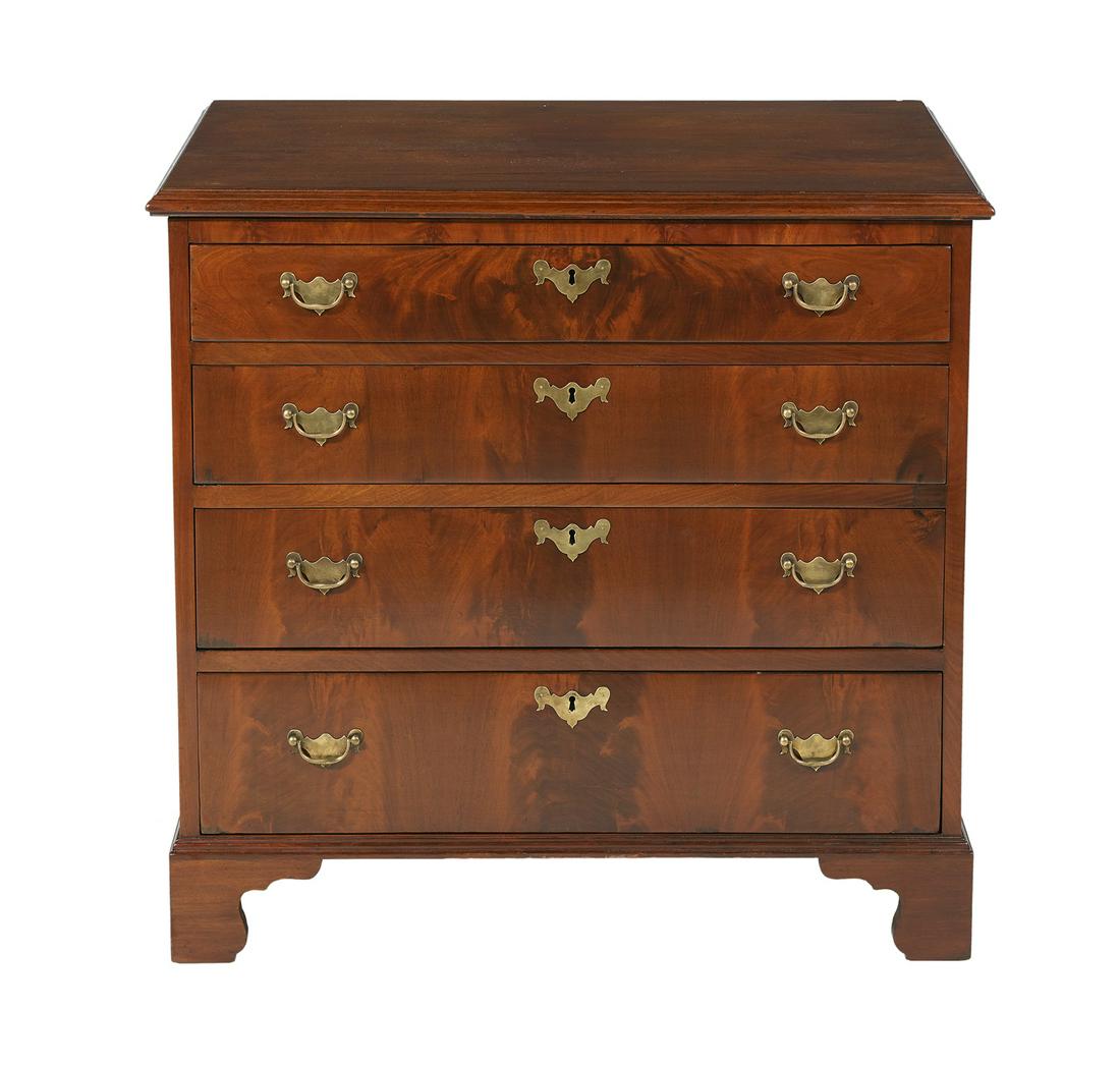 George III-Style Mahogany Crest: George III-Style Mahogany Crest late 19th century, the rectangular top above a conforming case fitted with four graduated long drawers, with finely figured veneers, raised on bracket feet. h. 31-1/2",