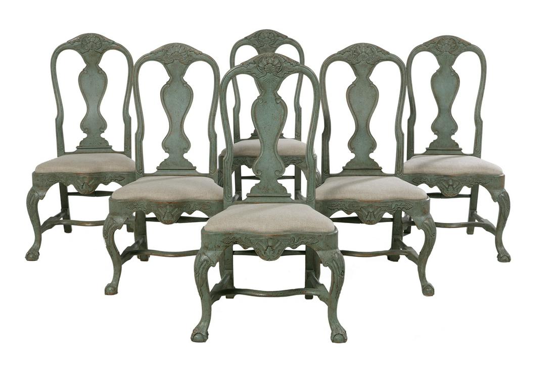 Six Polychromed Dining Chairs: Suite of Six Polychromed Dining Chairs in the Dutch Rococo Taste each with a shell- and foliate-carved crest over a shaped splat, and a serpentine slip seat with like carving on the seat rail, raised 