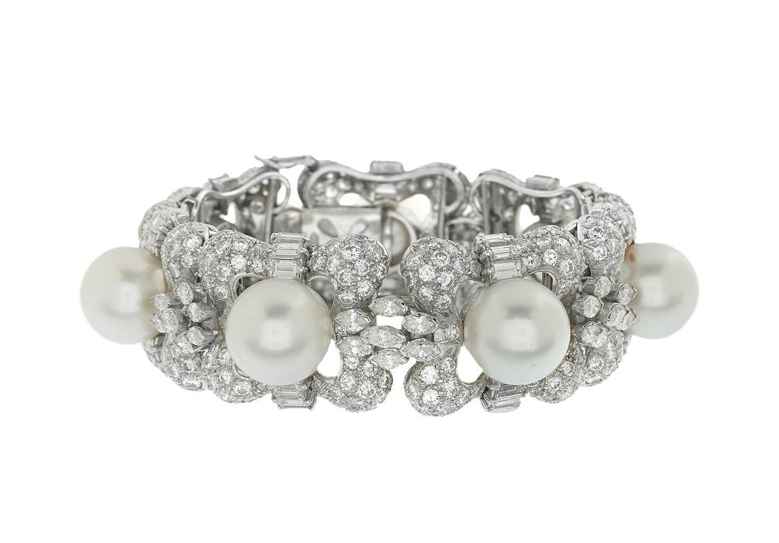 Stunning Pearl and Diamond Bracelet: Stunning Pearl and Diamond Bracelet platinum, the bracelet mounted with white South Sea pearls with a high luster, measuring approximately 12.00 mm to 13.00 mm, set on a wide interlocking chain bracel