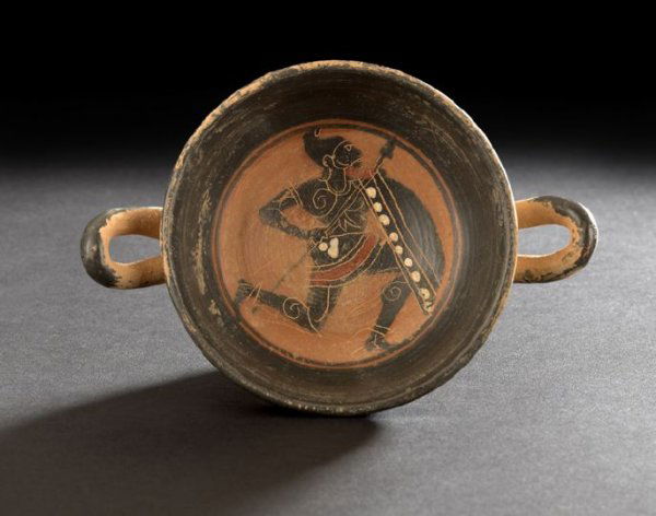 Small "Grand Tour" Pottery Kylix: Small "Grand Tour" Pottery Kylix, fourth quarter 19th century, in the ancient Greek "Black Figure" style, the interior decorated with a running spear- and shield-bearing warrior, the exterior decorate
