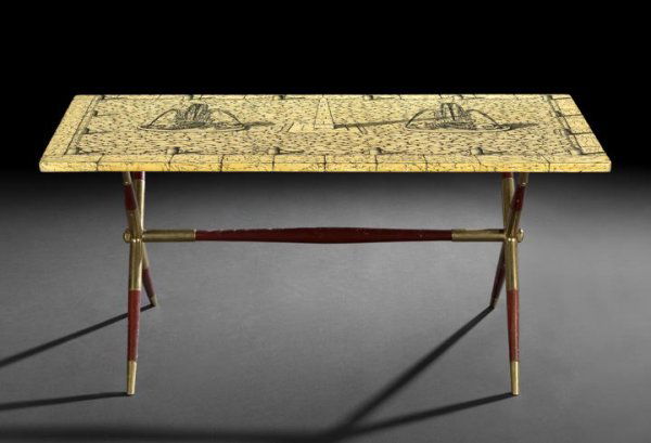Elegant Fornasetti, Milan, Cocktail Table: Elegant Fornasetti, Milan, Cocktail Table, third quarter 20th century, the yellow and black lithographed top featuring a piazza with a pair of dolphin fountains flanking an obelisk, resting on a deep