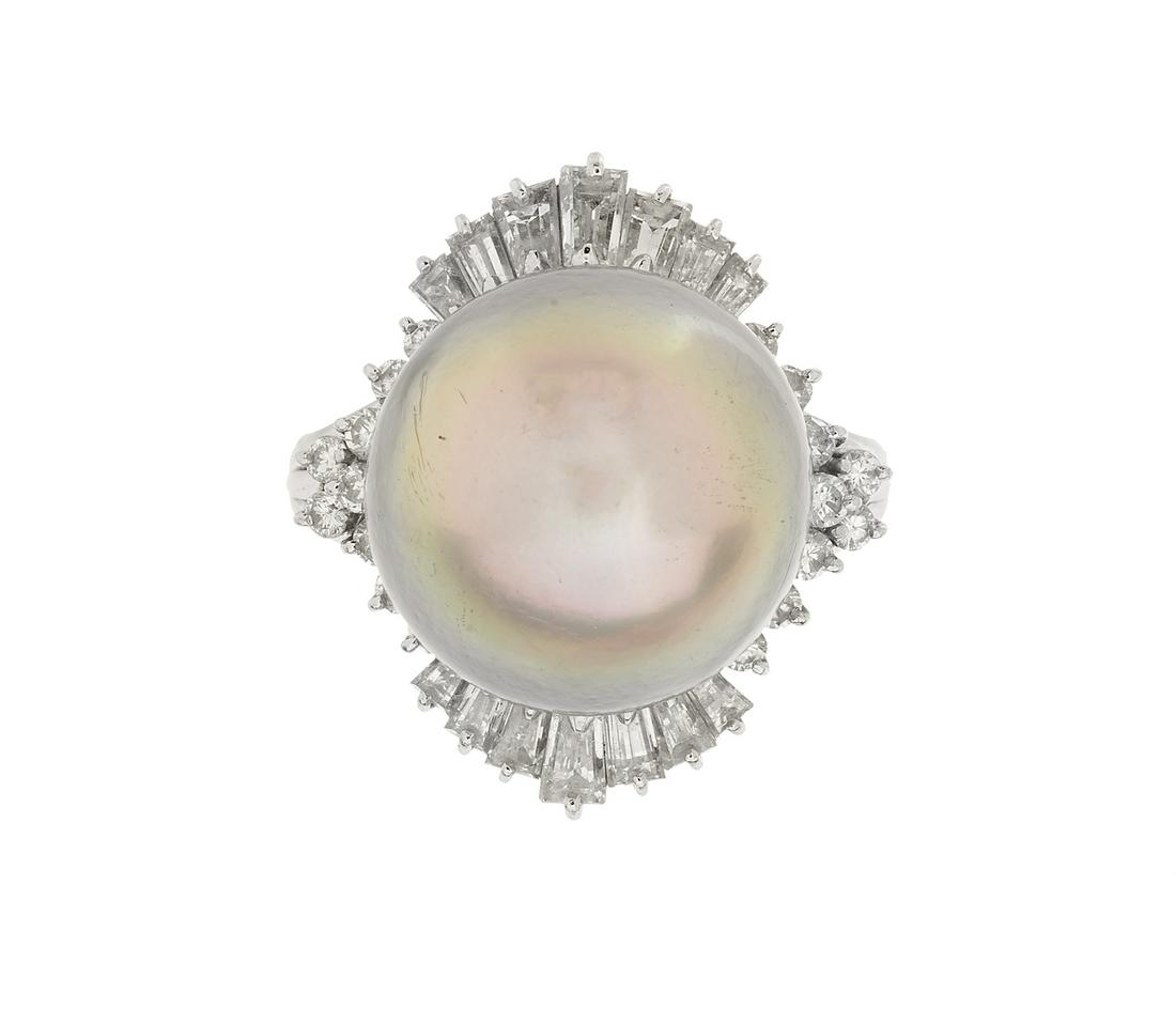 Tahitian Pearl and Diamond Ring: Tahitian Pearl and Diamond Ring platinum, the ring mounted with a 14.5 mm Tahitian pearl with a good luster, accented by baguette-cut and round brilliant-cut diamonds weighing approximately 0.81 carat