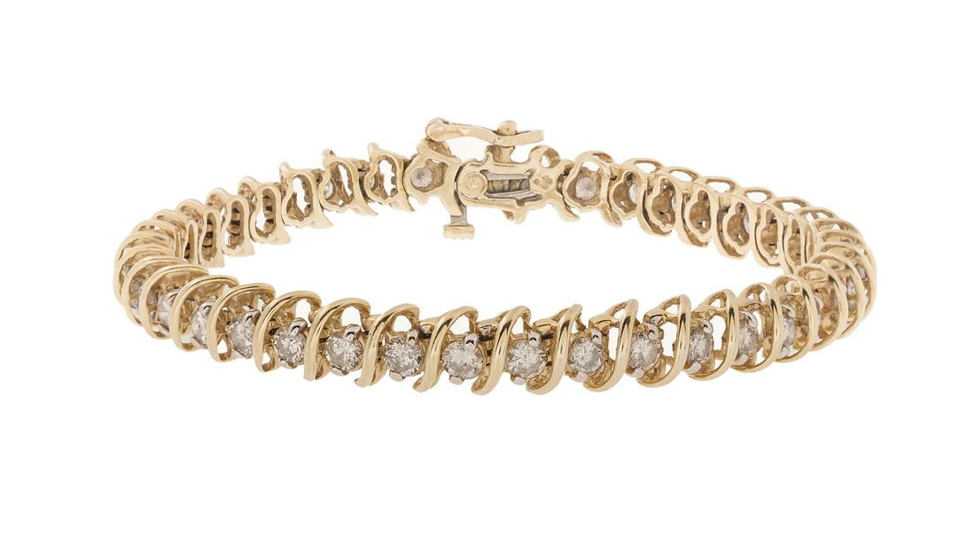 Diamond Tennis Bracelet: Diamond Tennis Bracelet 14k yellow gold, the bracelet mounted with round brilliant-cut diamonds weighing approximately 3.20 carats in total. l. 7", total weight 18.1 grams Provenance: The Estate of Bo
