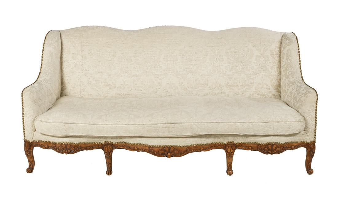 Louis XIV-Style Fruitwood Settee: Louis XIV-Style Fruitwood Settee early 20th century, the padded triple-domed back joined by padded downswept arms to the cushioned seat, raised above a shaped shell-carved apron on cabriole legs endin