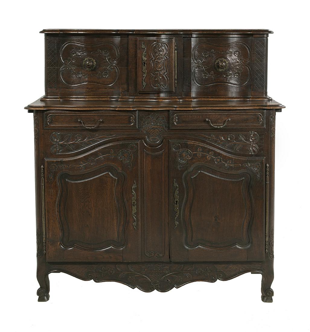 Provincial Louis XV-Style Oak Buffet a Deux Corps: Provincial Louis XV-Style Oak Buffet a Deux Corps in two parts, the step-back serpentine upper section with a central door flanked by a pair of sliding doors, and with carved panels, on a base with a 