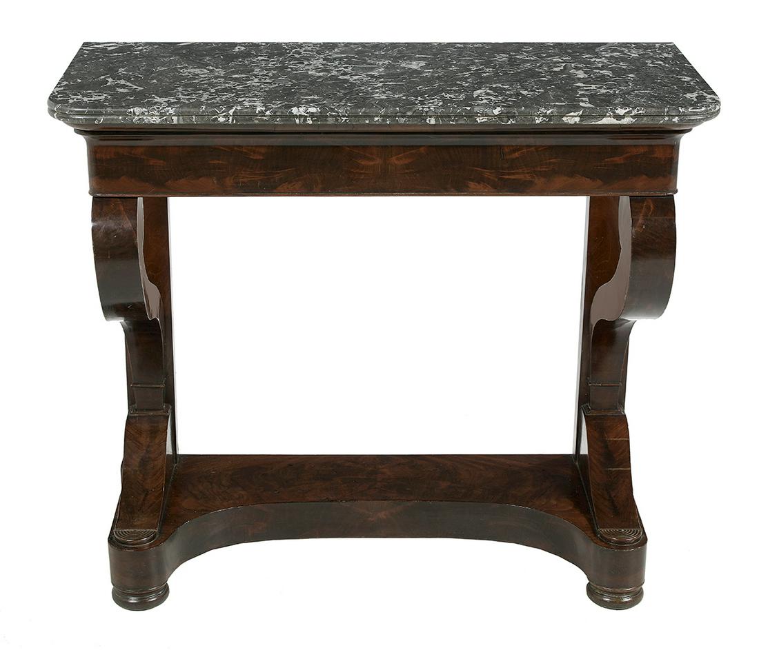 Louis-Philippe Marble-Top Console Table: Louis-Philippe Mahogany and Marble-Top Console Table mid-19th century, the black and gray marble top with rounded ends, above a conforming, shallow ogee frieze concealing a long drawer, supported by s