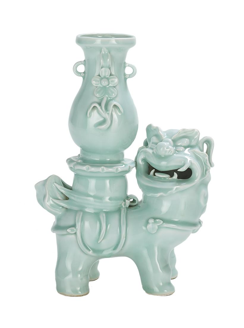 Chinese Celadon Foo Dog Vase: Chinese Celadon Foo Dog Vase 20th century, the flower-molded vase resting on a foo dog with a pierced mouth. h. 13-3/4", w. 8-1/2", d. 4-1/2" Provenance: JF Chen, San Francisco, California.