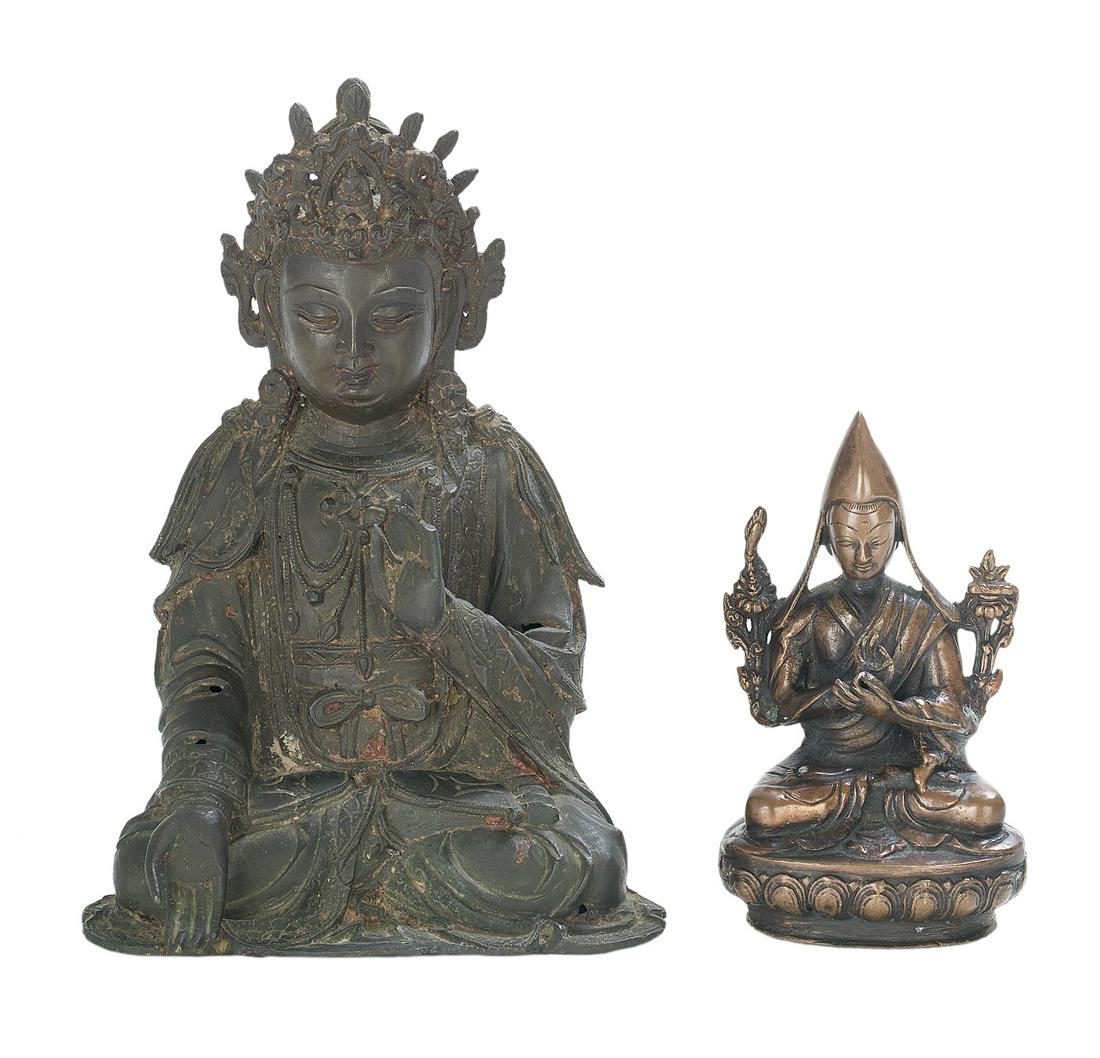 Two Asian Metal Figures of Guanyin: Two Asian Metal Figures of Guanyin 19th/20th century, including a large metal depiction, possibly 19th century, h. 11", w. 7", d. 4-3/4", and a smaller bronze interpretation stamped "Nepal", h. 7", w.