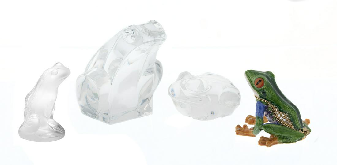 Whimsical Collection of Four Small Frog Figurines: Whimsical Collection of Four Small Frog Figurines 20th century, including three crystal examples, each acid-etched Lalique, Steuben or Orrefors at bottom, together with an enameled frog box with hinge