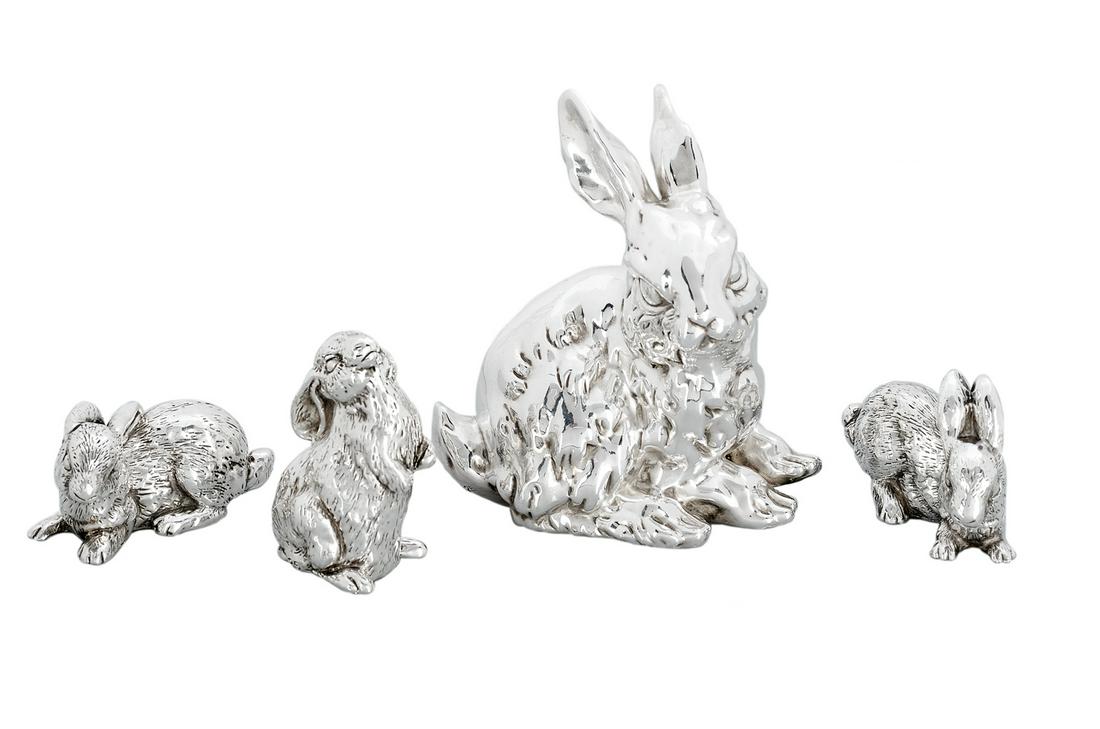 Bonded Porcelain-Filled Sterling Silver Figures: Four Bonded Porcelain-Filled Sterling Silver Figures of a Rabbit Family contemporary, including a mother and three bunnies, all in different poses. h. 4-3/4" to 1-1/2", l. 4-1/2" to 1-1/2" Provenance: