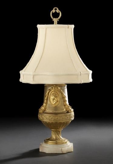 French Gilded Engine-Turned Brass Garniture Vase: French Gilded Engine-Turned Brass Garniture Vase, third quarter 19th century, in the Louis XVI style, now mounted as a table lamp on a custom pink-veined white onyx base and fitted with a custom "old 