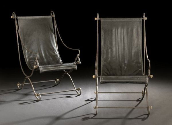 Pair of David Hicks Campeche Chairs: Pair of David Hicks (English, 1929-1998) Iron and Leather Campeche Chairs, the scrolling iron frame with reeded gilt ball accents and supporting the sling leather seat, raised on a crossover base endi