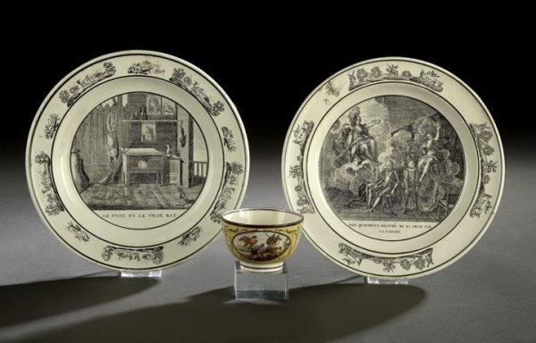 Three Pieces of French Faience Dinnerware: Three Pieces of French Faience Dinnerware, first quarter 19th century, including a pair of black and antique white Creil Montereau plates of, respectively, "Le Chat et le Vieux Rat" and "Don Quixote D