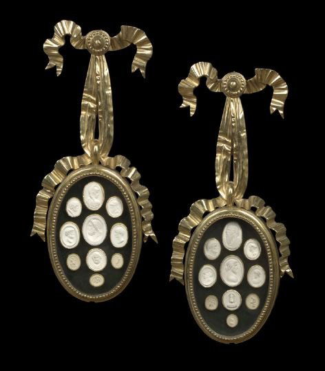 Pair of Edwardian Gilt-Bronze Shadowboxes: Fine Pair of Edwardian Gilt-Bronze Bowknotted Shadowboxes, first quarter 19th century, in the style of Robert Adam (English, 1728-1792), each containing ten plaster intaglios after Antique gems, h. 16