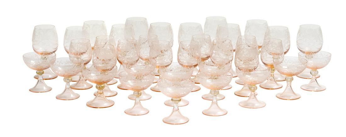 Venetian Murano Partial Stemware Service: Venetian Murano Partial Stemware Service 20th century, comprised of twelve water goblets, h. 6-3/4", twelve wine goblets, h. 6", and twelve champagne coupes, h. 4", all with pink bodies engraved with 