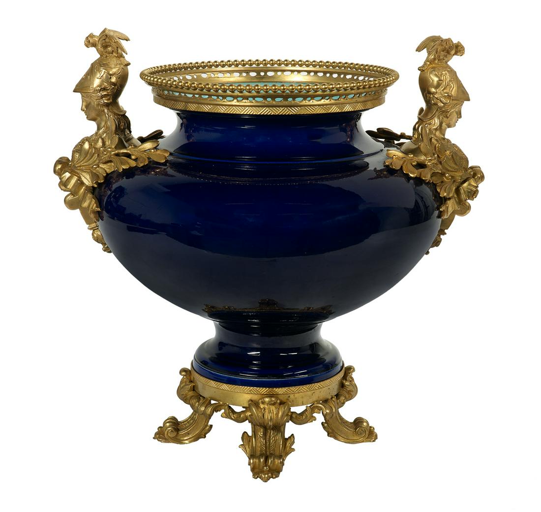 Gilt-Bronze-Mounted Sarreguemines Jardiniere: Gilt-Bronze-Mounted Sarreguemines Majolica Jardiniere fourth quarter 19th century, the cobalt jardiniere mounted with bronze handles depicting Athena, the owl of wisdom on her head, framed in oak leaf