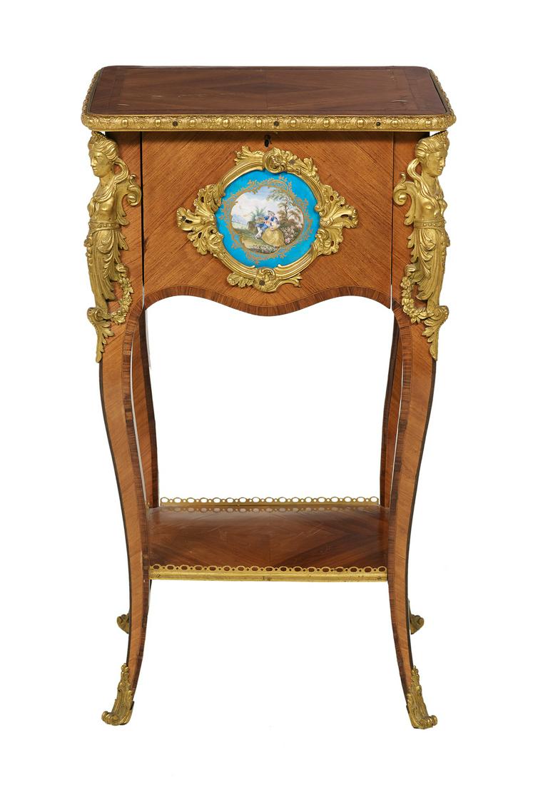 Louis XV-Style Kingwood Occasional Table: Louis XV-Style Kingwood Occasional Table early 20th century, the rectangular banded and quarter-veneered top within a decorative ormolu band, above a case fitted with a single cupboard centered by a "