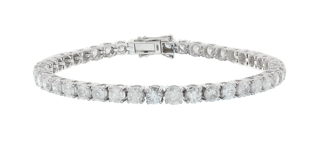 Diamond Tennis Bracelet: Diamond Tennis Bracelet 14k white gold, the bracelet mounted with round brilliant-cut diamonds weighing approximately 8.00 carats in total, approximate color I-J-K and clarity SI1-I1. l. 7", total wei