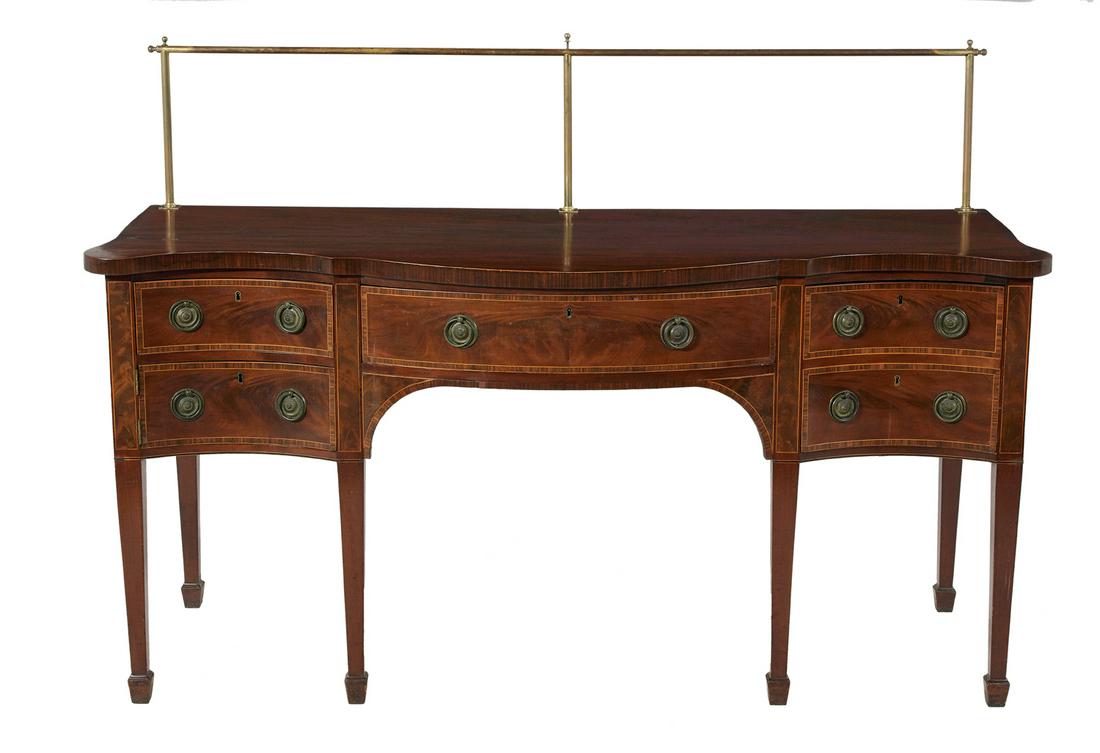 George III Mahogany Sideboard: George III Mahogany Sideboard early 19th century, the shaped and bowed top above a conforming case fitted with a central drawer, flanked to one side by a drawer over a cupboard and to the other by a s