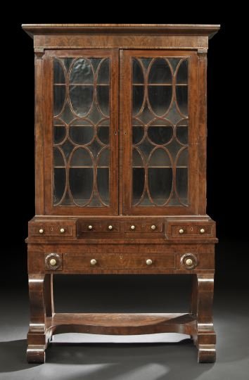 American Late Classical Secretary Bookcase: American Late Classical Mahogany Secretary Bookcase, second quarter 19th century, Baltimore, in two parts, the upper section with a projecting cyma-carved cornice over a pair of mullioned doors, flank