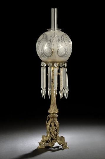 Fine Cornelius and Baker Prism-Hung Solar Lamp: Fine Cornelius and Baker Gilt-Brass, Bronze and Prism-Hung Solar Lamp, 1851-1861, Philadelphia, Pennsylvania, the font retaining the maker's label, the globular period cut and frosted glass shade on a