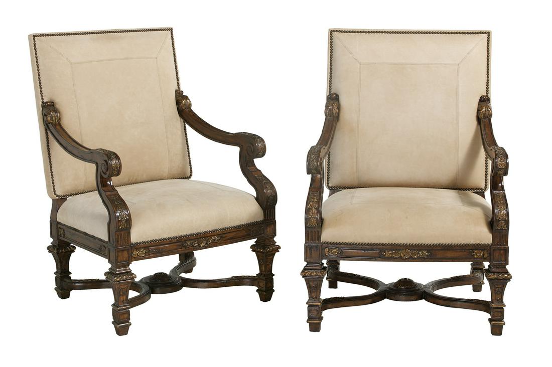 Pair of Baroque-Inspired Fruitwood Fauteuils: Pair of Baroque-Inspired Fruitwood Fauteuils 20th century, each of generous scale, the open arms on scroll supports, adorned with foliate carving, with like carving on the apron, the legs joined by a 
