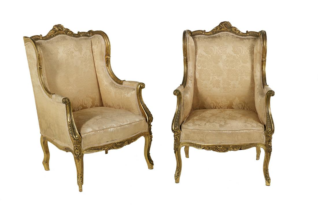 Pair of Louis XV-Style Bergeres avec Oreilles: Pair of Louis XV-Style Giltwood Bergeres avec Oreilles late 19th century, each with a padded back surmounted by a foliate crest, joined by shaped and padded sides and out-scrolled arms to the cushione