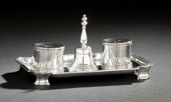 George V Sterling Silver Inkstand: George V Sterling Silver Inkstand, hallmarked London, 1929-1930, by Richard Comyns in the early Georgian taste, the rectangular stand with shaped corners, conforming bracket feet and molded rim, fitte