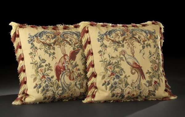 Pair of Aubusson Tapestry-Faced Sofa Pillows: Sumptuous Pair of Aubusson Tapestry-Faced Sofa Pillows, of large square form in the Napoleon III taste, the Aubusson panels featuring parrots perched on foliate scrolls amidst flowers, the edges richl