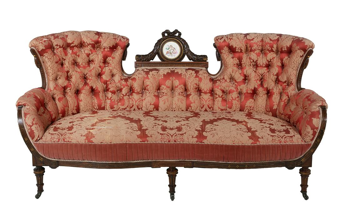 American Neo-Grec Rosewood Sofa: American Neo-Grec Rosewood, Gilt-Incised and Porcelain-Mounted Sofa ca. 1871, based on the stamped production number 28892, attributed to Pottier & Stymus, New York, the back of tripartite form, with 