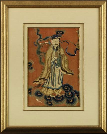 Framed Chinese Embroidery Fragment: Framed Chinese Embroidery Fragment, 19th century, depicting a Ming Dynasty official in informal robes, standing on clouds against a red ground, presented in a double linen-matted giltwood frame and gl