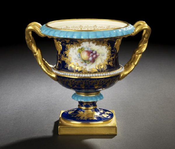 Fine Worcester Porcelain Vase: Fine Worcester Royal Porcelain Company Porcelain Vase, dated 1897 by British Design Registration numeral, richly gilded and enameled in cobalt blue, with two handles, of "Warwick" form, the interior o