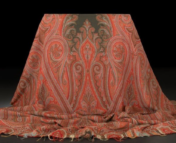 Lengthy Paisley Wool Shawl: Lengthy Paisley Wool Shawl, third quarter 19th century, the primary palette in carmine red, burnt orange, gray-blue and buff, w. 60", l. 118".