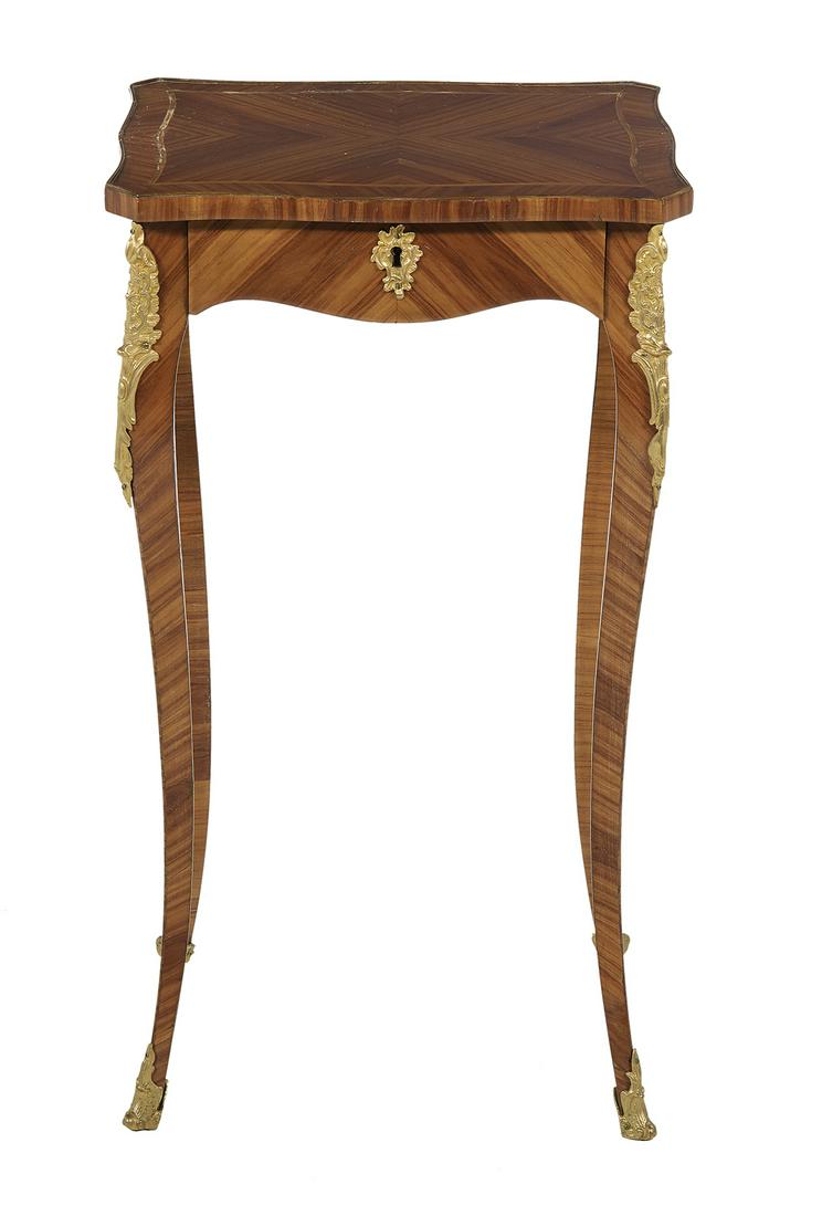 Louis XV-Style Kingwood Occasional Table: Louis XV-Style Kingwood Occasional Table 19th century, the banded and shaped rectangular top quarter-veneered and with projecting corners, above a frieze fitted with a single drawer, raised on slender
