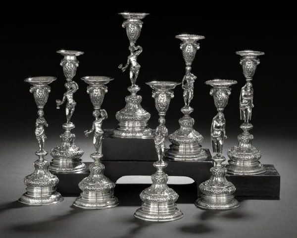 Eight German .800 Silver Figural Candlesticks: Set of Eight German .800 Silver Figural Candlesticks, ca. 1900, by Wolf & Knell, Hanau, each with a figural standard representing a Roman deity - Bacchus (3), Hercules (2), Ceres, Flora and Juno - abo