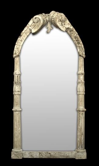 Italian Polychromed Pine Looking Glass: Italian Polychromed Pine Looking Glass, constructed of antique architectural elements, the bisected, domed plate surmounted by a heavily scrolled crest and flanked by fluted and foliate-carved upright