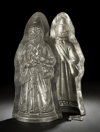 German Metal "Father Christmas" Chocolate Mold: German Metal "Father Christmas" Chocolate Mold, first quarter 20th century, of bipartite form and monumental size, h. 21-1/2", w. 9-1/2".
