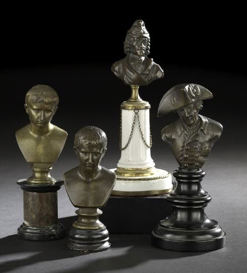 Four-Piece Group of Tabletop Bronzes: Four-Piece Group of Tabletop Bronzes, consisting of a French patinated bronze bust of Voltaire in a Phrygian cap and set upon a gilt-brass-mounted white porcelain pedestal base in the Louis XVI style,