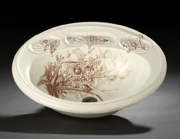 Good, Large English Creamware Wash Basin: Good, Large English Creamware Wash Basin, by Brown Westhead, Moore and Company, Cauldon, Staffordshire, of ovoid form with underglaze brown transfer print in the "Canova" pattern, comprised of songbir