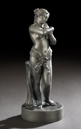 Wedgwood Basalt-Ware Figure of "Spring": Wedgwood Basalt-Ware Figure Allegorical of "Spring", fourth quarter 19th century, modeled as a scantily draped female figure cradling a dove in her proper left hand, entitled on the circular base, the