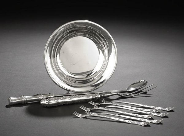 Nine Pieces of Assorted Silver and Silverplate: Nine Pieces of Assorted Silver and Silverplate Tableware, 20th century, including a Tiffany-retailed sterling silver "bamboo"-handled claret spoon, l. 12", a Gorham sterling silver-handled "H"-pattern