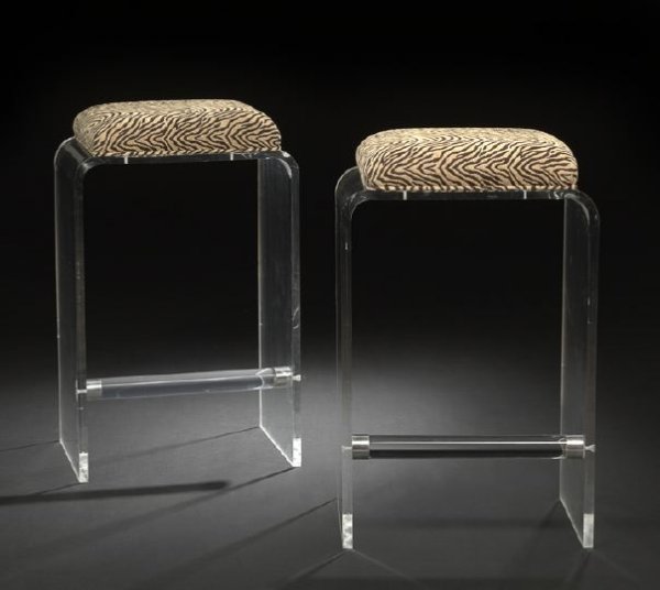 Pair of Art Deco Revival Lucite Bar Stools: Pair of Art Deco Revival Lucite Bar Stools, third quarter 20th century, each of squared curvilinear form with a padded animal print seat, the solid sides joined by a tubular footrest stretcher, h. 30-