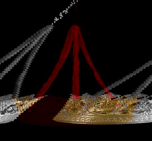 Large Gilded Cast-Iron and Brass Bed Couronne: Large Gilded Cast-Iron and Brass Bed Couronne, fourth quarter 19th century, in the First Empire style, suspended on four later metal chains, each fitted with a shirred antique-red silk sleeve, h. 6" (