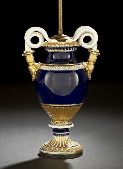Meissen Richly Gilt Porcelain Garniture Vase: Meissen Richly Gilt Cobalt-Blue Porcelain Garniture Vase, third quarter 19th century, the model designed for Meissen in 1866, with double-serpent handles, h. 16", now mounted as a lamp, overall h. 24"