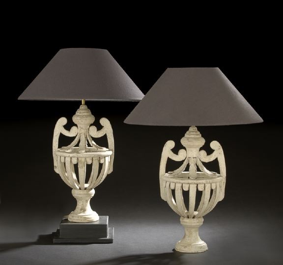 Pair of Italian Provincial Wooden Garniture Vases: Pair of Italian Provincial Wooden Garniture Vases, in the neoclassical taste, each turned, sawn and staved vase with two handles, and painted in a lightly distressed matte white finish, now mounted as