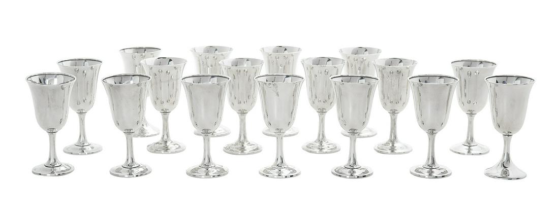 Seventeen Sterling Silver Water Goblets: Seventeen Sterling Silver Water Goblets mid-20th century, fifteen by Wallace Silversmiths, Wallingford, Connecticut, patterns #16 (eight) and #122 (seven), and two by M. Fred Hirsch, Jersey City, New