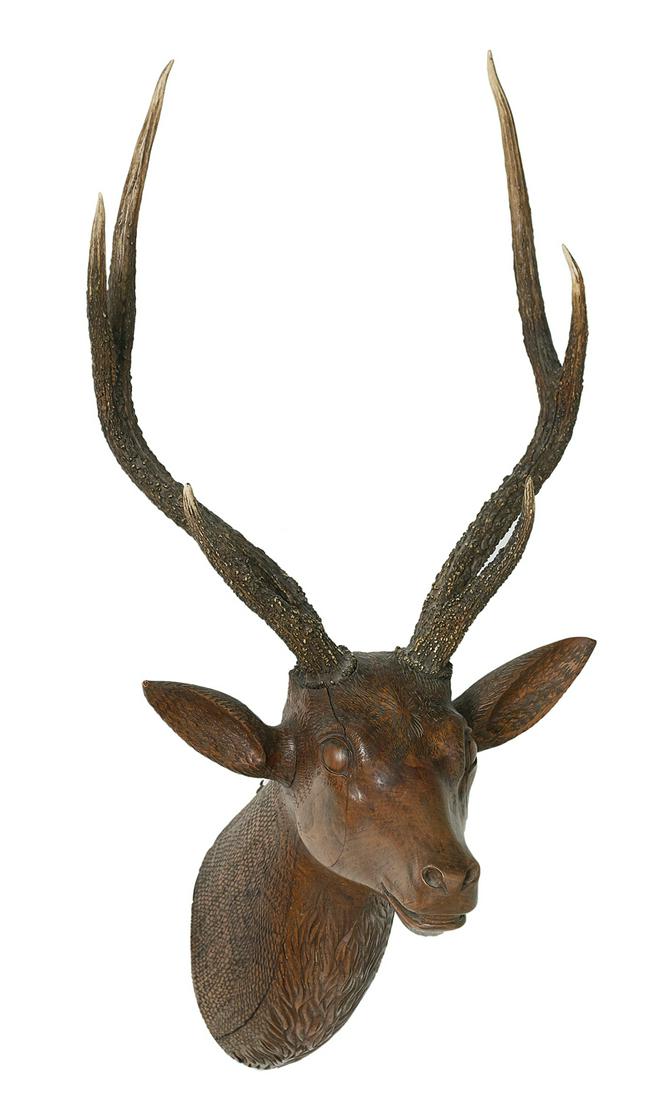 French Wood Head of a Stag with Natural Antlers: French Life-Sized Carved Wood Head of a Stag with Natural Antlers first half 20th century, the densely and delicately carved surface delineating the various textures of flesh, fur and bone, with hardw