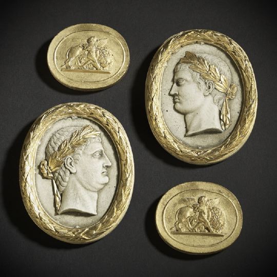 Two Pairs of Plaster Medallions: Two Pairs of Plaster Medallions, one a diminutive pair of "Grand Tour" parcel-gilt plaster oval portrait plaques of, respectively, the Roman emperors Nero and Caesar Augustus, 4" x 3-1/4", and the oth