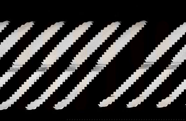 Six Christofle Silverplate Butter Spreaders: Set of Six Christofle Silverplate Butter Spreaders, fourth quarter 20th century, Paris, each with a "blunt"-shaped blade and stylized flat "pistol" handle, with reeded ferrule, l. 3-3/4", presented in